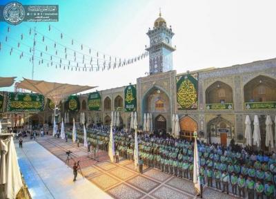 تصاویری بی نظیر از مراسم تعویض پرچم ایوان طلای حرم امام علی(ع)